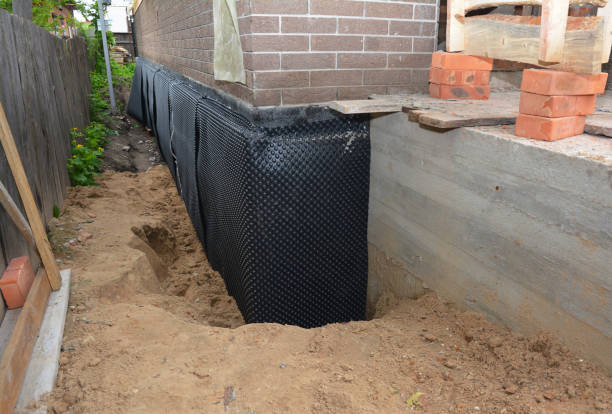 SJ Waterproofing Pros technician performing targeted Waterproofing assessment in Jasper, GA